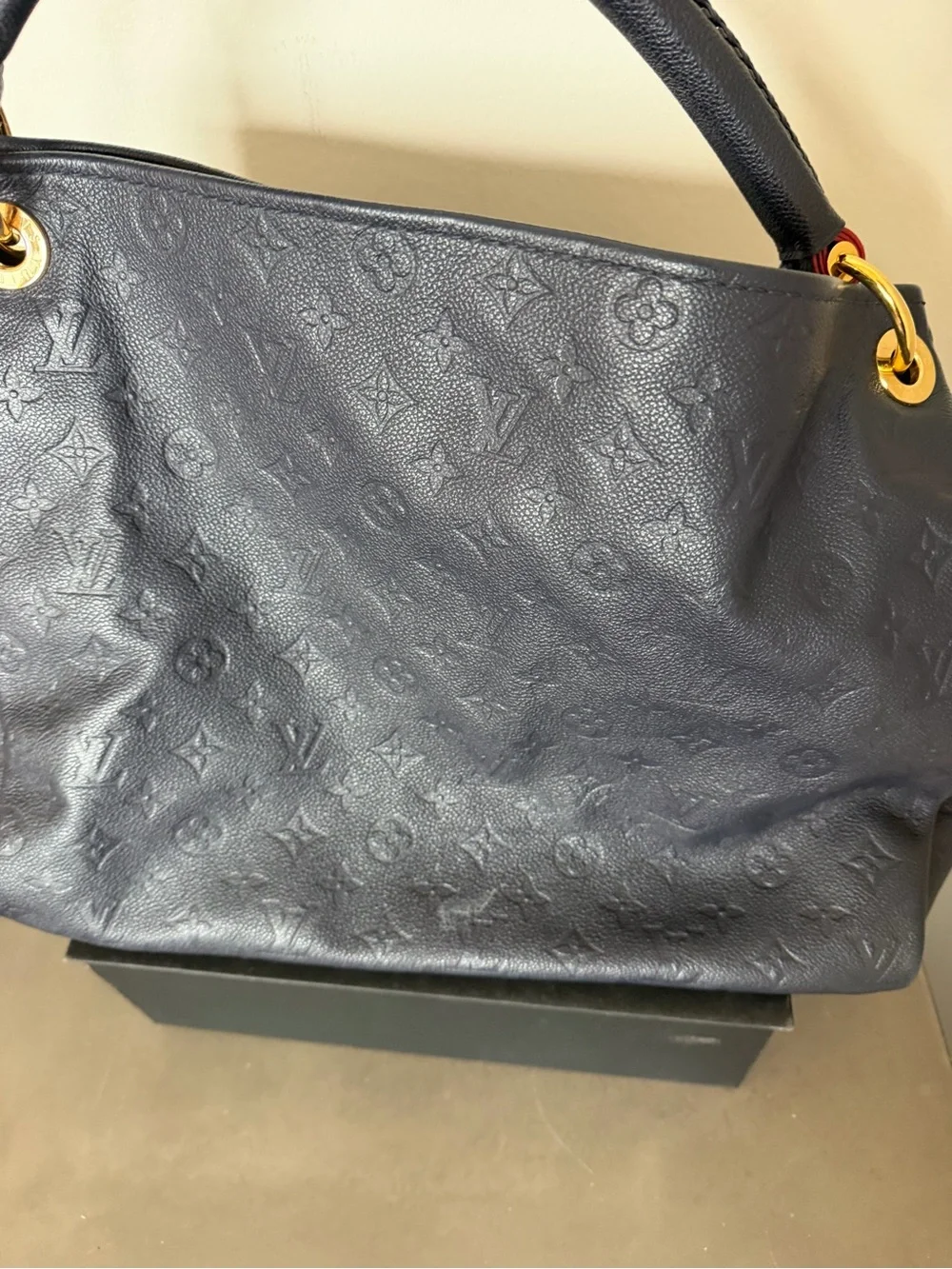 Louis Vuitton Navy Monogram Embossed Artsy Bag with Gold Hardware.